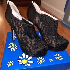 Rhinestoned black lace pumps